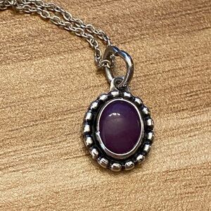 Dainty sugilite silver pendant on a 925 sterling silver chain.